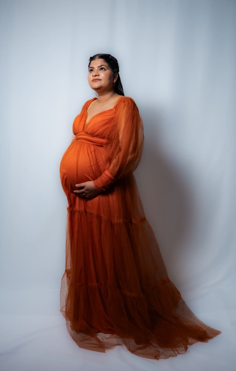 Maternity, studio silhouettes and coastal sunset — cover photo